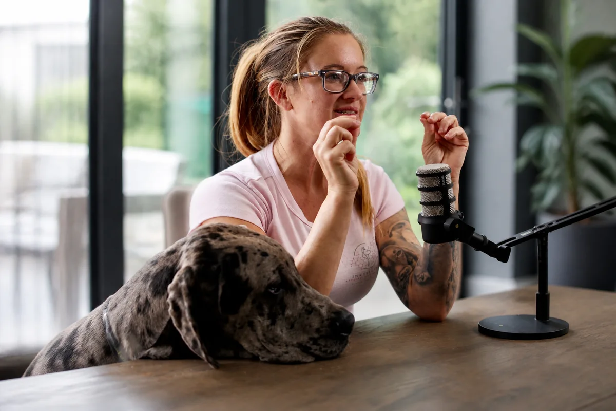Jo-Rosie Haffenden training a dog on a lead in the arena